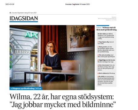 Sida från Svenska Dagbladet. Wilma Dahlgren sitter vid ett bord på en restaurang.